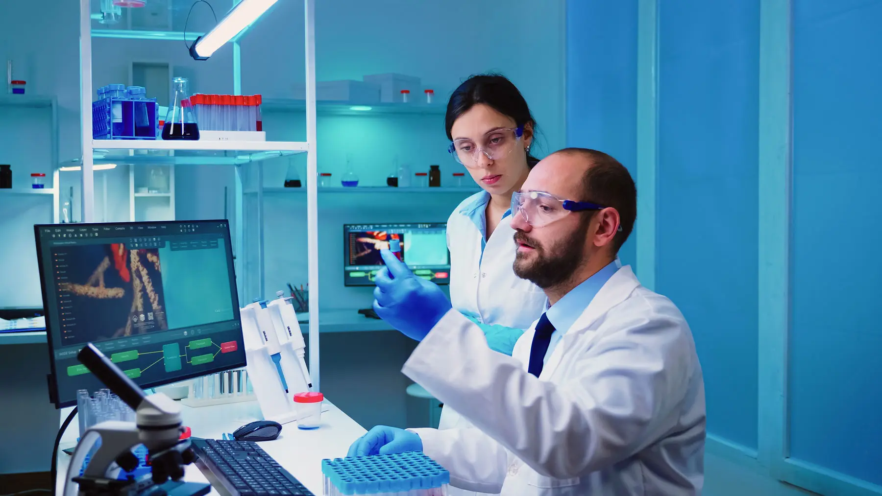 A collaborative team of scientific technicians from diverse backgrounds working in a U.S. lab.